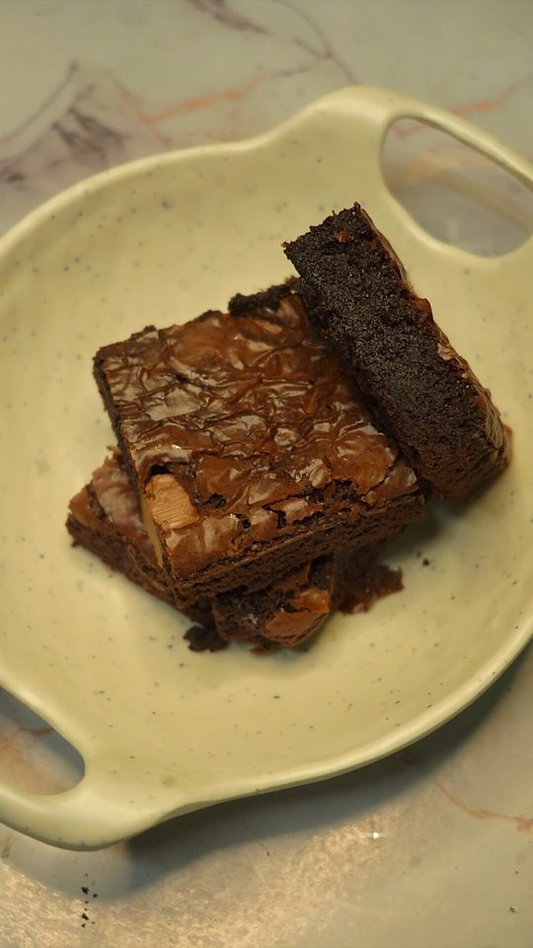 Fudgy brownie squares on a plate